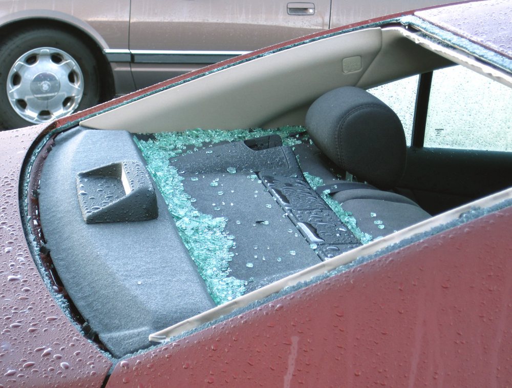 Hailstone-smashed back window of a car from 4 July 2010 hailstorm (Limon, eas…