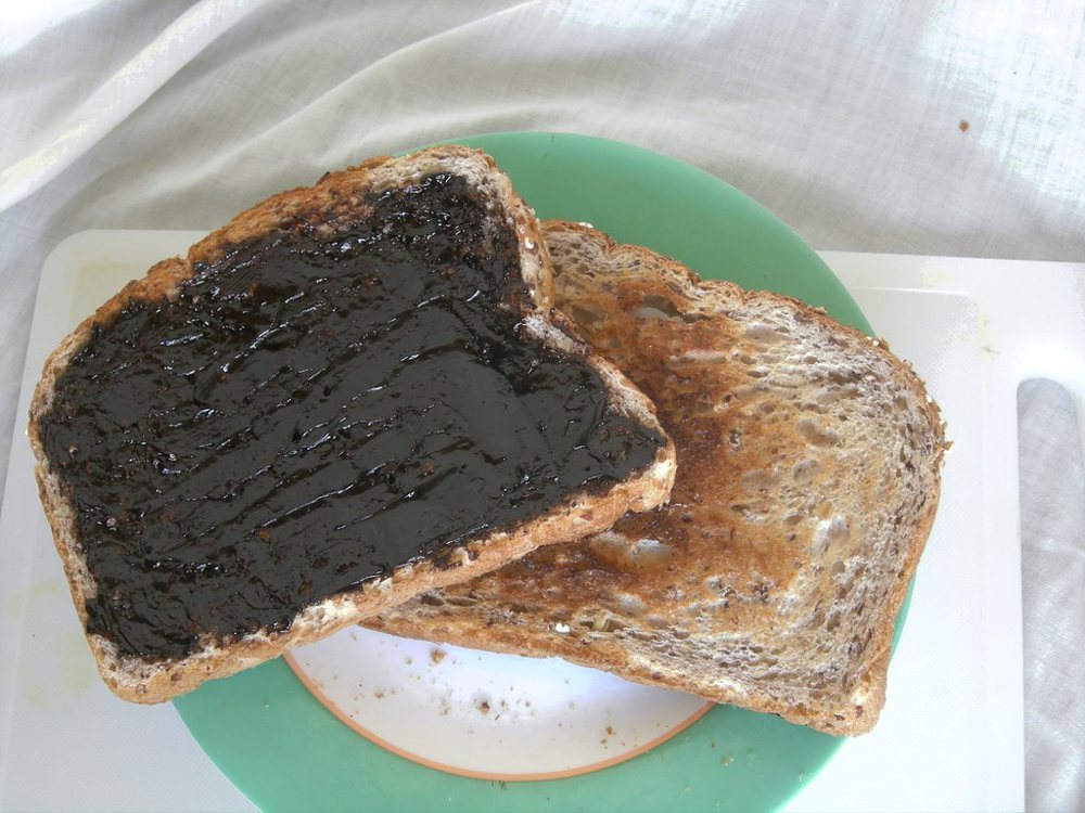 Marmite, thickly spread on toasted bread.