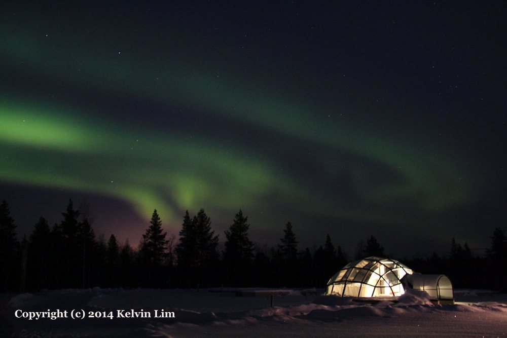 Aurora Borealis at the Glass Igloo Hotel in Kakslauttanen,Finland