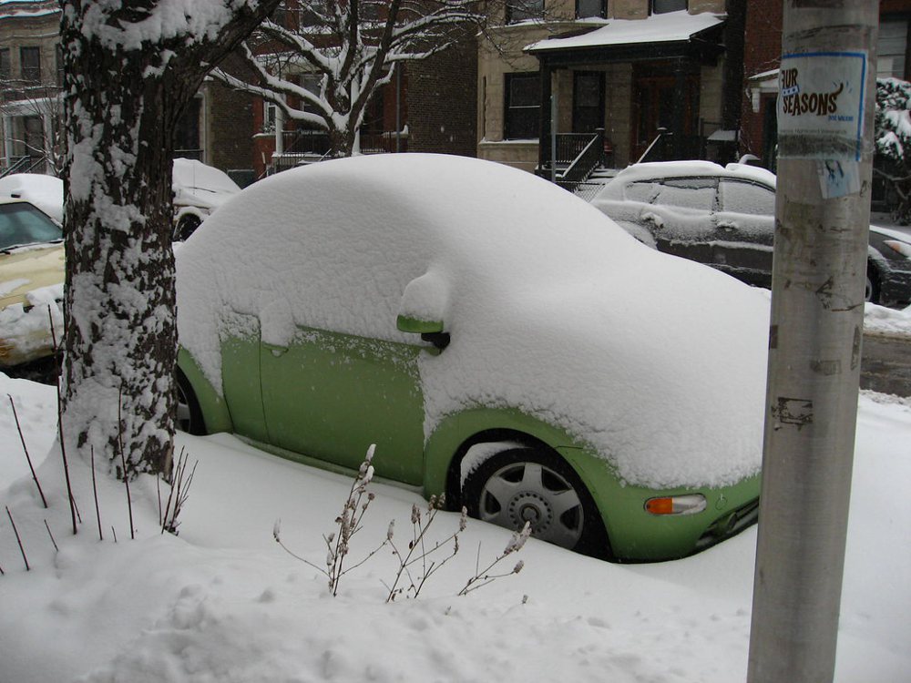 Snow covered car