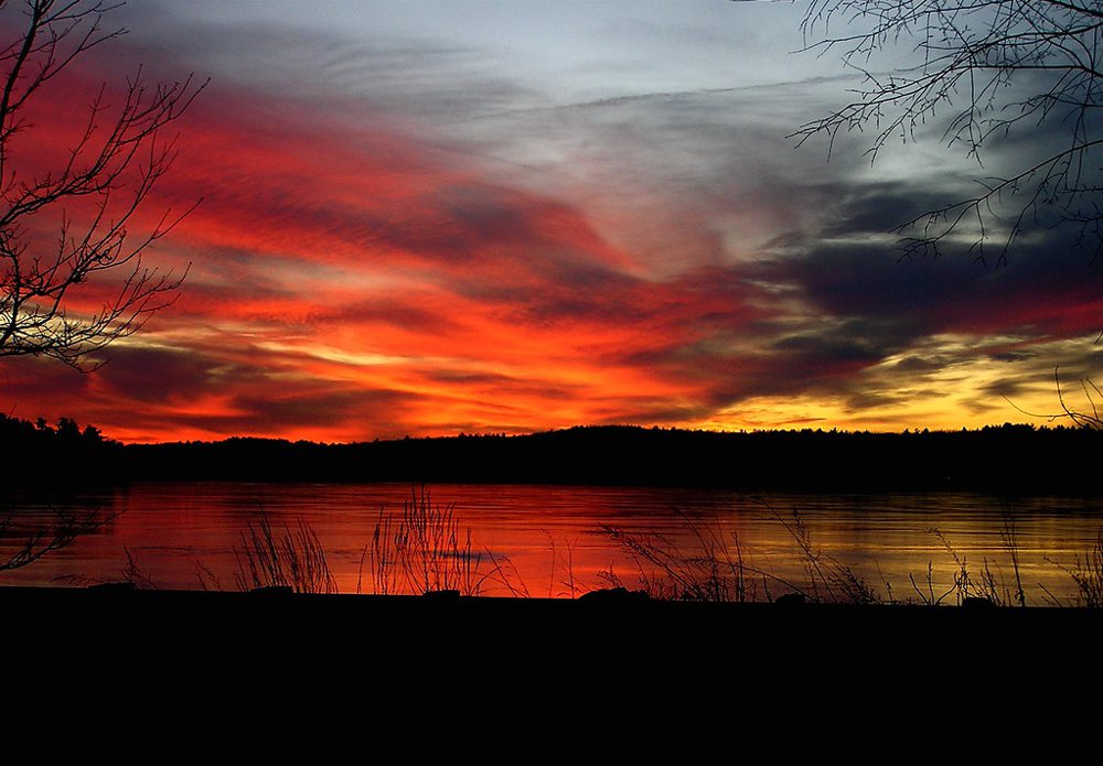 sunset over frozen Lake Nagog