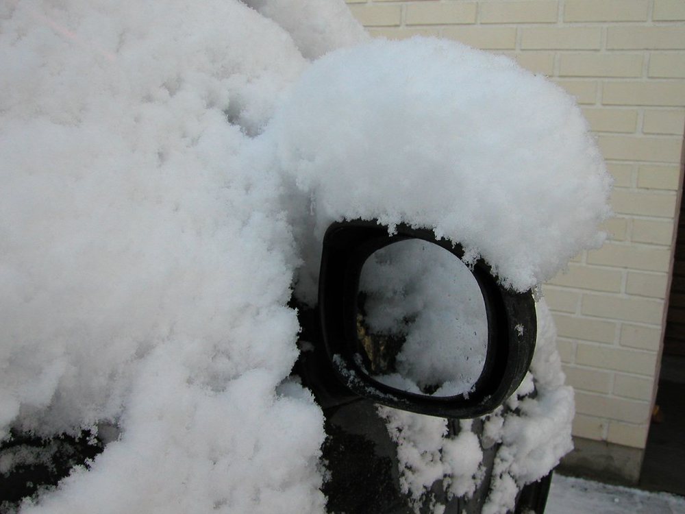 Snow Covered Car