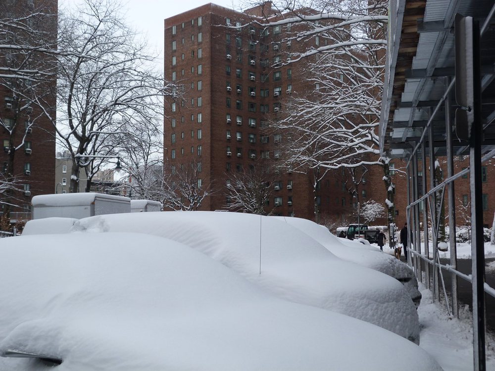 Snow-covered cars in Stuyvesant Town