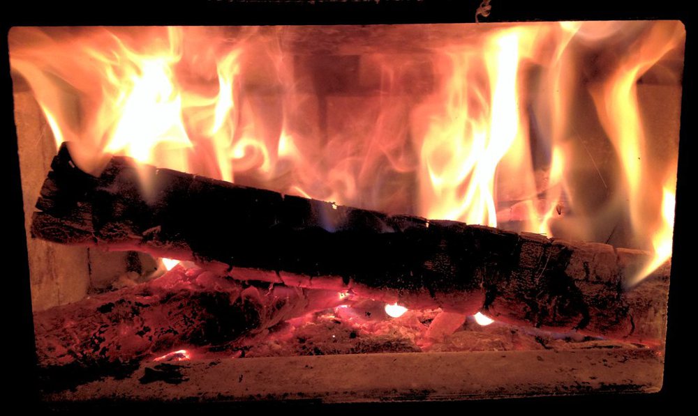 Warm wood stove fire