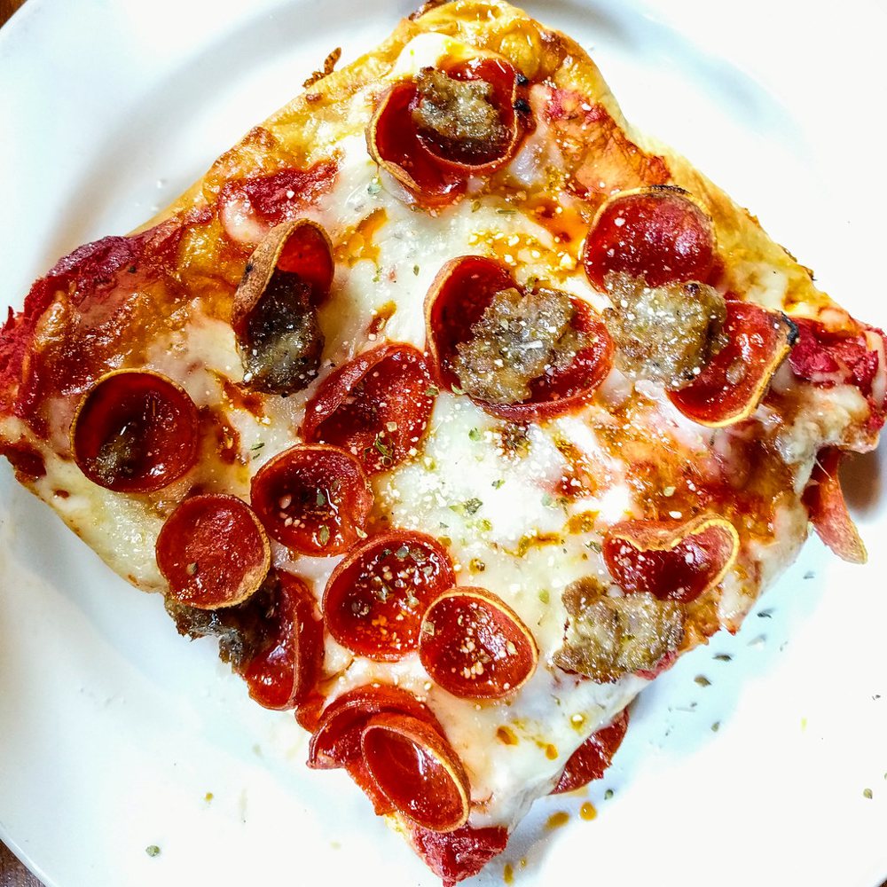 Sicilian pizza slice
