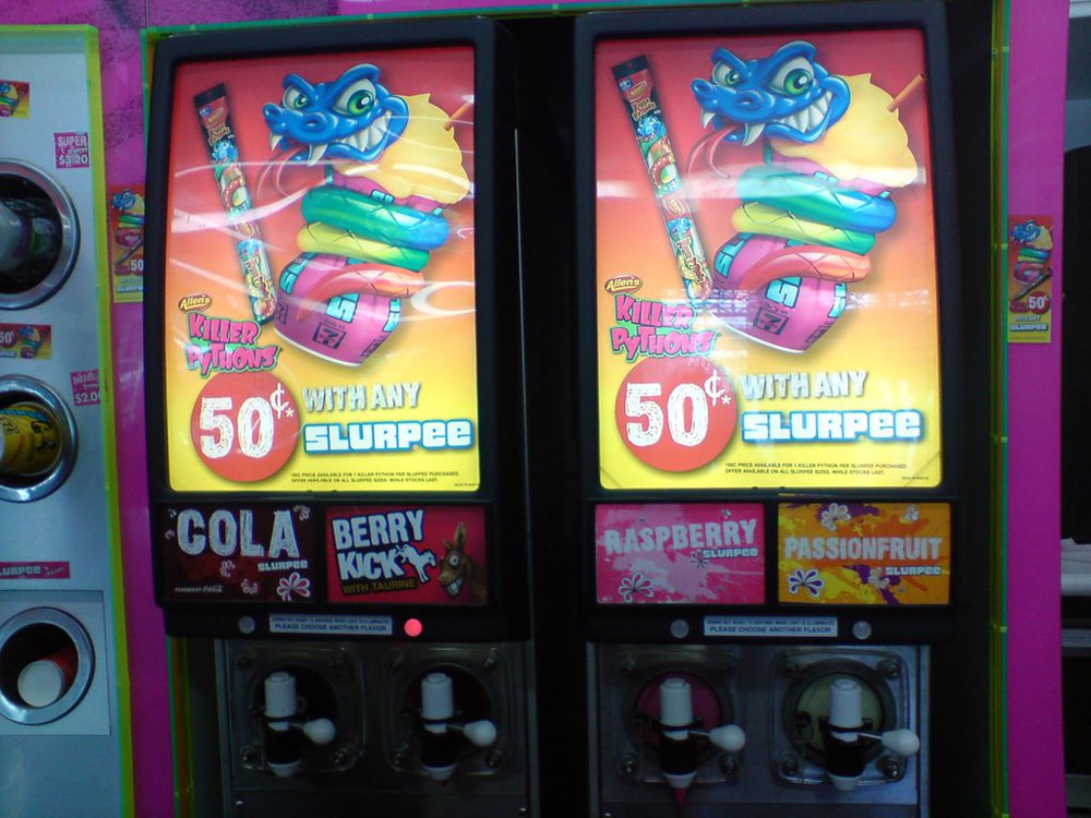 Cola, Berry Kick, Raspberry, Passionfruit Slurpee machine