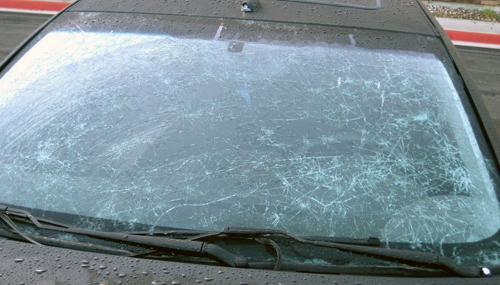 Hailstone-smashed front windshield of a car from 4 July 2010 hailstorm (Limon…